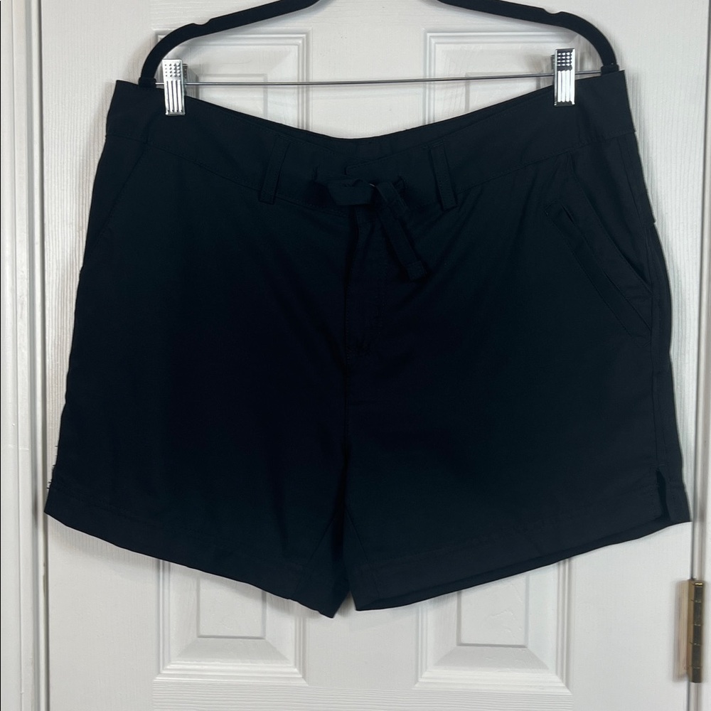 Magellan Outdoors black swim shorts size XL. Pockets 100% recycled polyester.